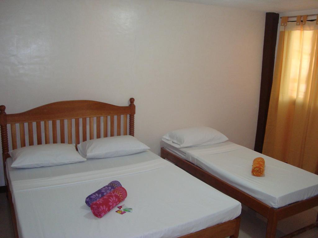 El Gallo Traveler'S Pension Puerto Princesa Exterior photo